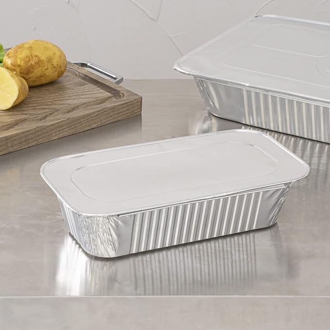 Restaurantware Aluminum Pan Cover 25 Count 12.69 x 6.56 Inch Oven Friendly Disposable Pan Lid 1/3 Size Foil Lid Temperature-Sealing Silver For Catering And Food Storage