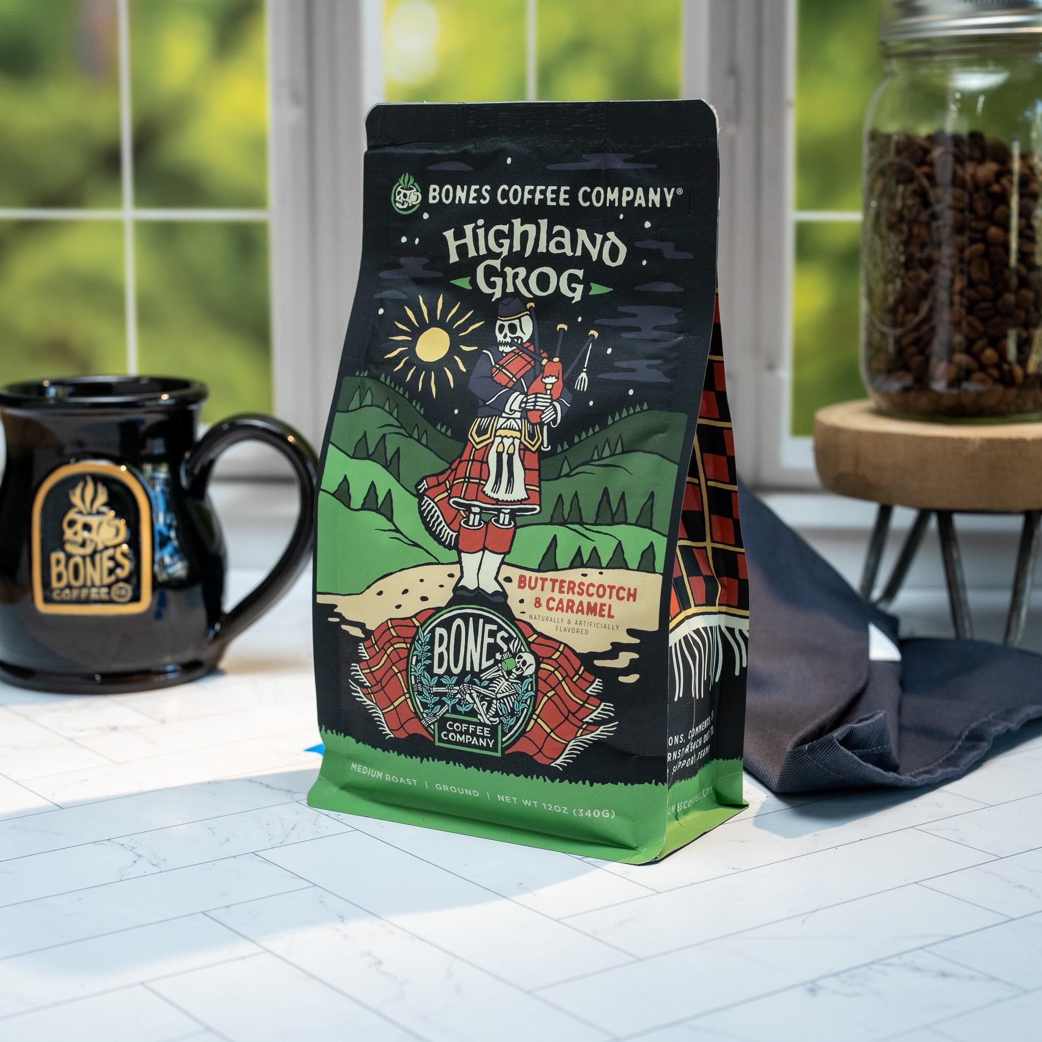 Bones Coffee Company Highland Grog, Butterscotch Caramel Flavored Coffee, Medium Roast Low Acid Arabica Beans Compatible with Auto drip and French Press Coffee Maker, 12 Oz Ground