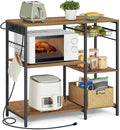 VASAGLE Baker's Rack, Coffee Bar Stand with Charging Station, 35.6 Inches Tall, Storage Shelves, Pull-Out Wire Basket, Table for Microwave, Kitchen, Honey Brown and Ink Black UKKS036K41